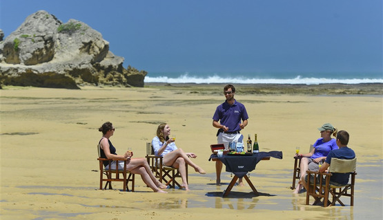 Guests enjoying a picnic on Kenton beach from River Lodge_1691751718416
