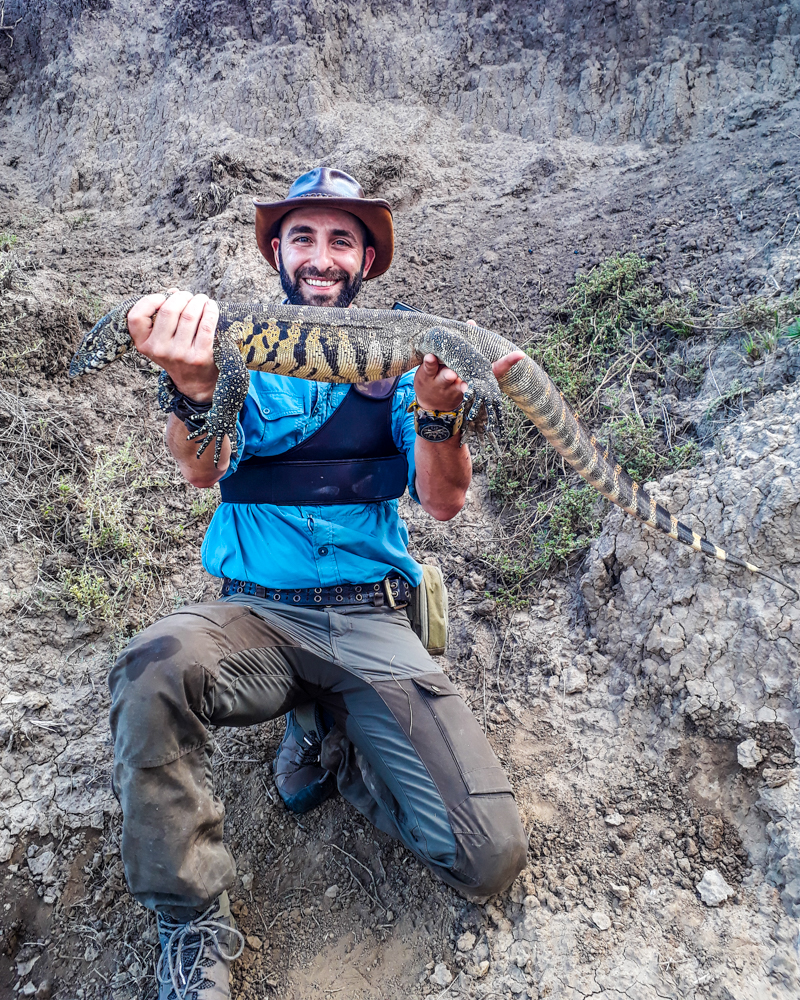 Coyote Peterson holding Water Monitor Lizard at Kariega