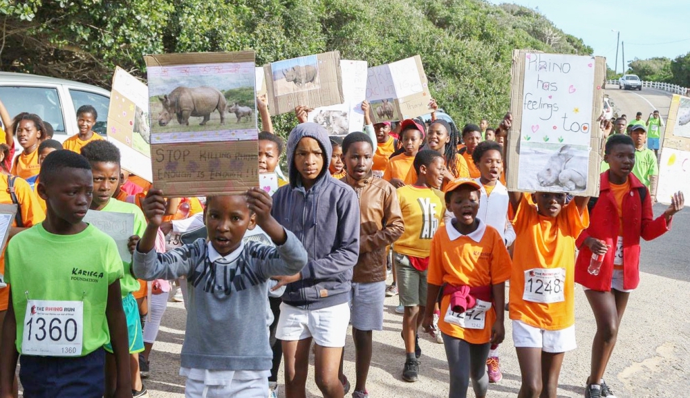 Kariega Community Sports Teams marching to save our rhino
