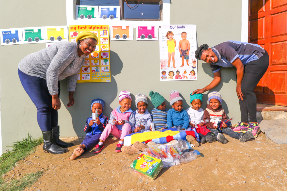 Nomawethu donating items to a local creche 