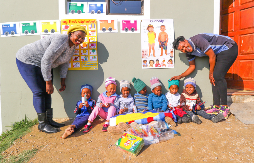 Guests donations to the Kariega Foundation being given to the children of the community