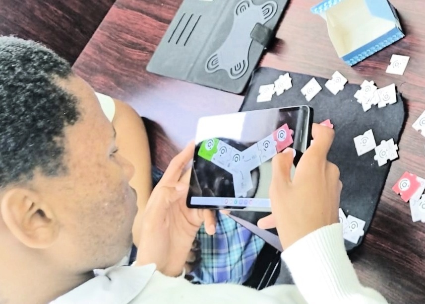 A child using a tablet for schoolwork