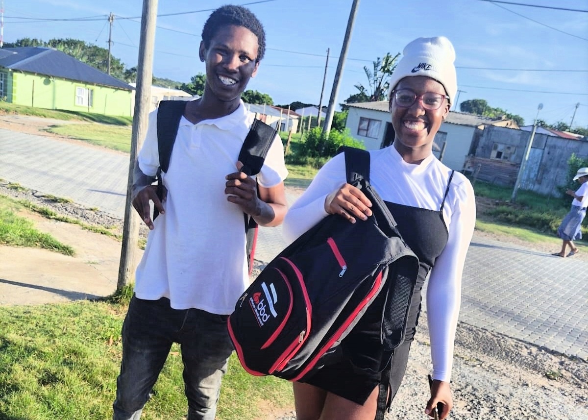 Happy learners being able to better their studies with technology 