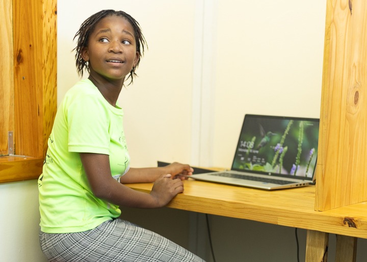 An eager learner working at the computer lab