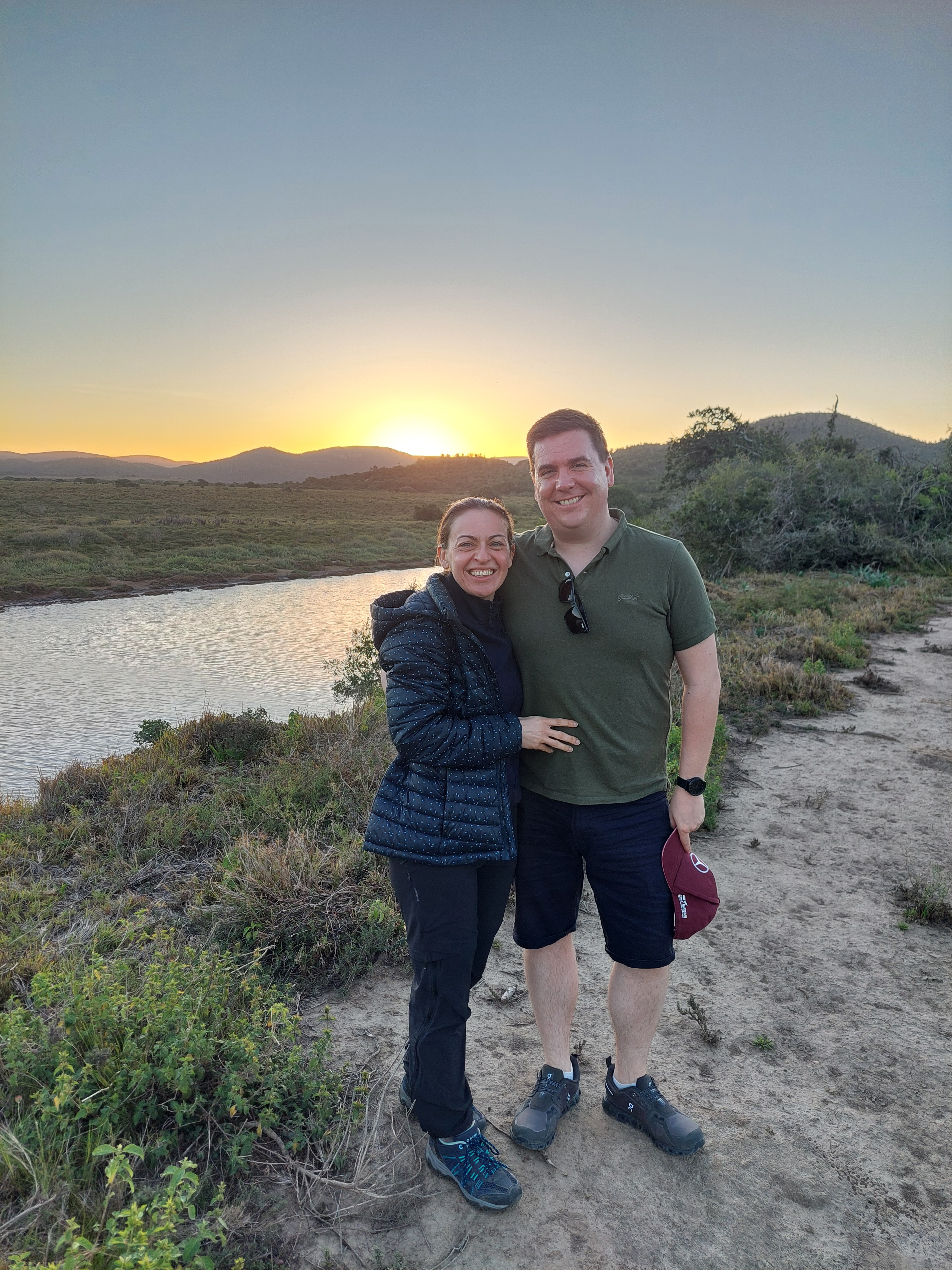 Kariega guest Eléa with her husband alongside the banks of the Bushmans River while on safari