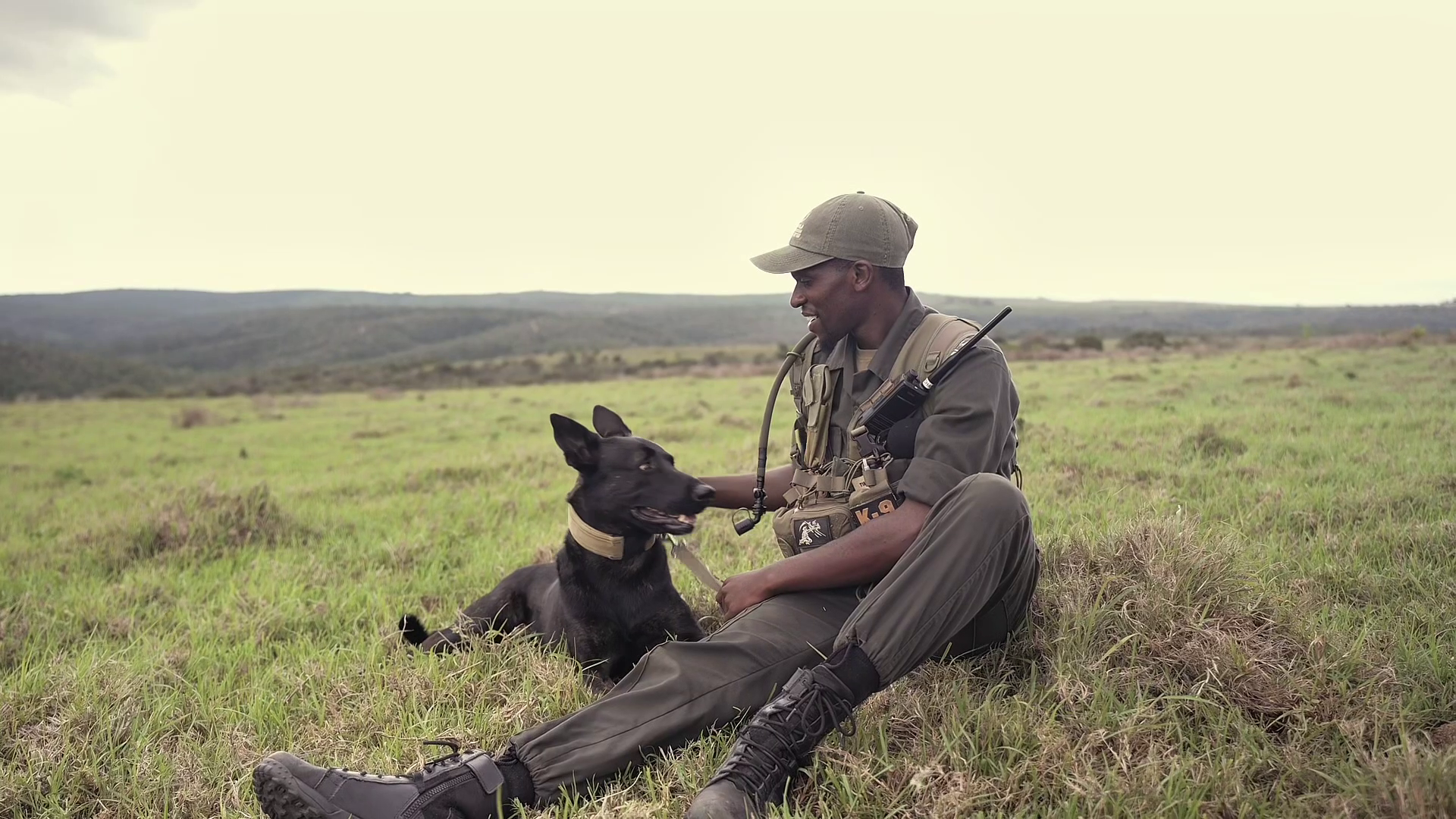 Handler And K9 Anti Poaching Unit On Kariega Game Reserve